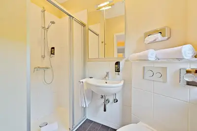 Ein Badezimmer in der Unterkunft Hotel Weinberg-Schlößchen