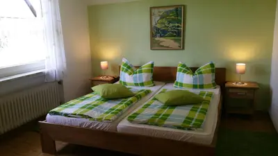 Ein Bett oder Betten in einem Zimmer der Unterkunft Pension Hermes