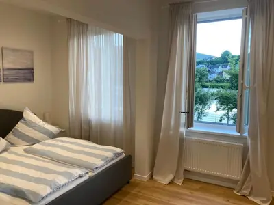 Ein Bett oder Betten in einem Zimmer der Unterkunft Apartment Hallenbach