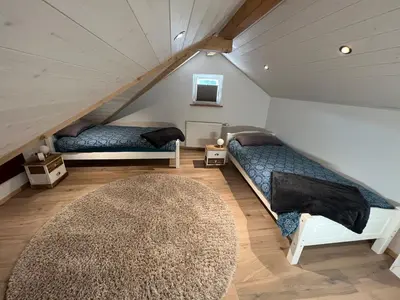 Ein Bett oder Betten in einem Zimmer der Unterkunft Ferienhaus 