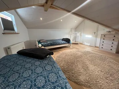 Ein Bett oder Betten in einem Zimmer der Unterkunft Ferienhaus 