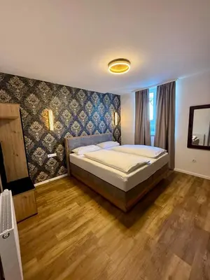 Ein Bett oder Betten in einem Zimmer der Unterkunft Hotel Restaurant Unikat