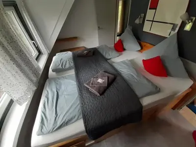 Ein Bett oder Betten in einem Zimmer der Unterkunft Eifel Residence