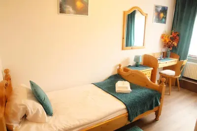 Ein Bett oder Betten in einem Zimmer der Unterkunft Hotel-Restaurant Zum Burgkeller