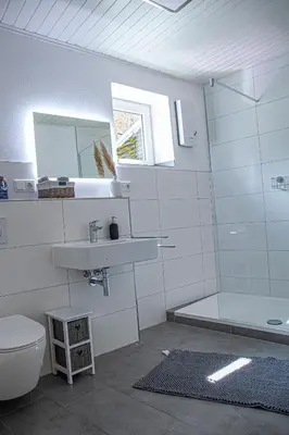 Ein Badezimmer in der Unterkunft Suite Cuveé Zell
