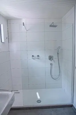 Ein Badezimmer in der Unterkunft Suite Cuveé Zell