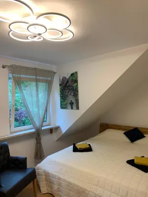 Ein Bett oder Betten in einem Zimmer der Unterkunft Ferienwohnung 