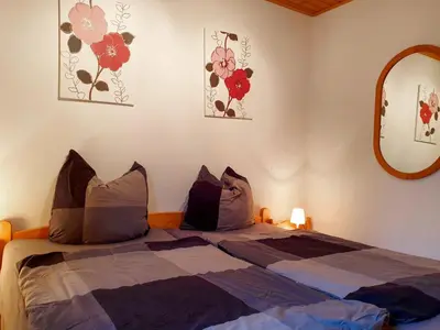 Ein Bett oder Betten in einem Zimmer der Unterkunft Holiday Home Haus Tausendschön by Interhome