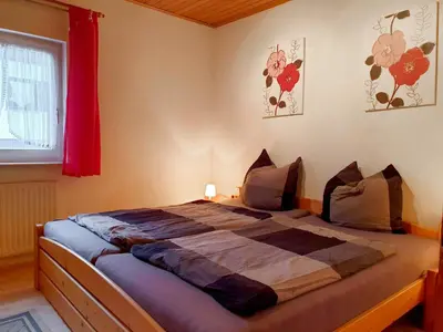 Ein Bett oder Betten in einem Zimmer der Unterkunft Holiday Home Haus Tausendschön by Interhome