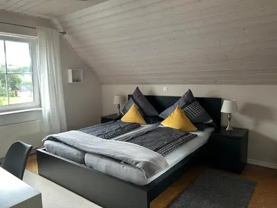 Ein Bett oder Betten in einem Zimmer der Unterkunft Gemütliche Ferienwohnung im Hunsrück