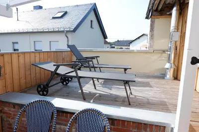 Ein Balkon oder eine Terrasse in der Unterkunft Ferienunterkunft Vulkaneifel - Baltes-Haus