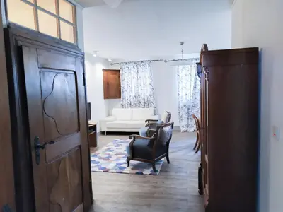 Ein Sitzbereich in der Unterkunft Living-in-History: Meister Carl Apartment