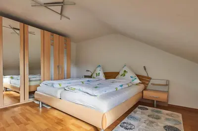 Ein Bett oder Betten in einem Zimmer der Unterkunft Ferienwohnung Sonya