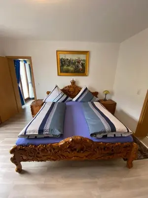 Ein Bett oder Betten in einem Zimmer der Unterkunft Holiday Apartment mit Moselblick im Moselhaus