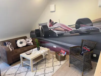 Ein Sitzbereich in der Unterkunft Haus Lotusblüte