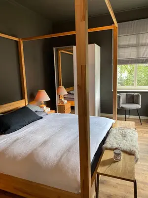 Ein Bett oder Betten in einem Zimmer der Unterkunft Ring Residenz in Adenau direkt am Nürburgring