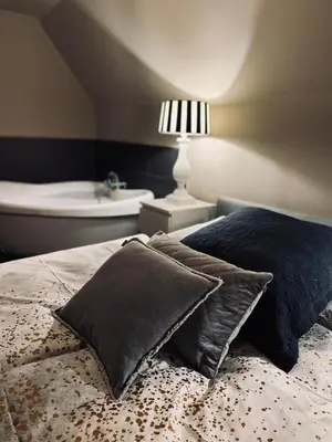 Ein Bett oder Betten in einem Zimmer der Unterkunft Ring Residenz in Adenau direkt am Nürburgring