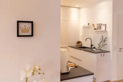Küche/Küchenzeile in der Unterkunft NEU MoselROYAL Luxus 2-4 Pers Design Klima