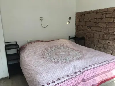 Ein Bett oder Betten in einem Zimmer der Unterkunft Dachterrassenwohnung - nah am See