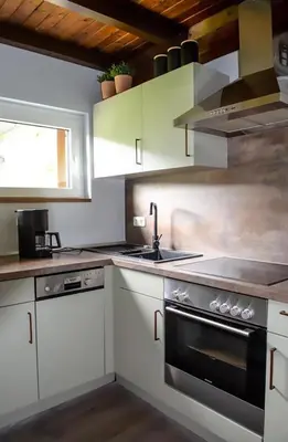 Küche/Küchenzeile in der Unterkunft Eifel Cottage Biersdorf am See