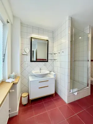 Ein Badezimmer in der Unterkunft Gästehaus No. 3