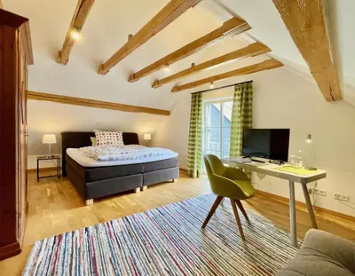 Ein Bett oder Betten in einem Zimmer der Unterkunft Gästehaus No. 3