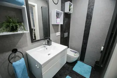 Ein Badezimmer in der Unterkunft Viktera Modernes Apartment mitten in der Stadt und doch sehr ruhig Zu Therme 2 Minuten