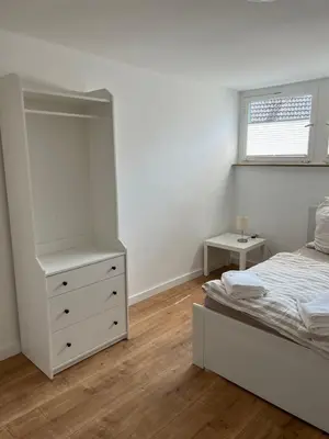 Ein Bett oder Betten in einem Zimmer der Unterkunft Gästehaus Melitta