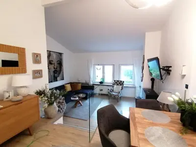 Ein Sitzbereich in der Unterkunft Eifelhäuschen am See