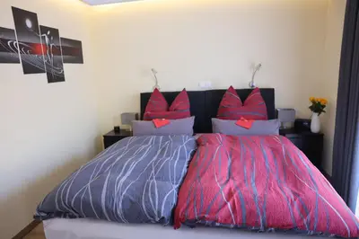Ein Bett oder Betten in einem Zimmer der Unterkunft Loreley Hills Residence 2