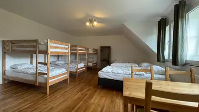 Ein Bett oder Betten in einem Zimmer der Unterkunft Die Strumpffabrik - Guesthouse