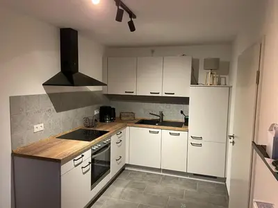 Küche/Küchenzeile in der Unterkunft Spatzennest am Taubenhaus Residenz Moselliebe