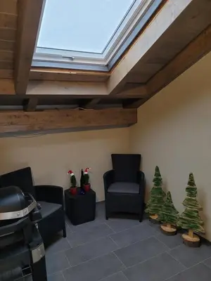 Ein Sitzbereich in der Unterkunft Beim Eifelfranken