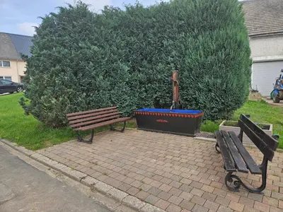 Ein Garten an der Unterkunft Haus am Brunnen Wohnung 2
