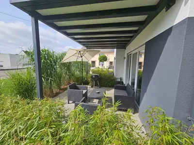 Ein Garten an der Unterkunft Haus am Brunnen Wohnung 2