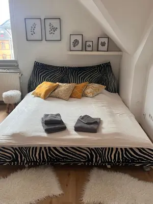 Ein Bett oder Betten in einem Zimmer der Unterkunft App7 - place2b - direkt am Rhein