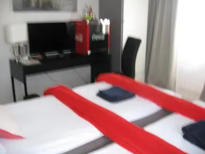 Ein Bett oder Betten in einem Zimmer der Unterkunft Diamanthaus 2 Koblenz