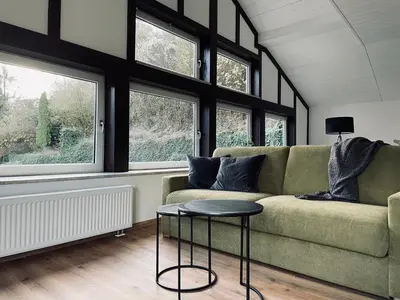 Ein Sitzbereich in der Unterkunft Turteltäubchen am Taubenhaus Residenz Moselliebe