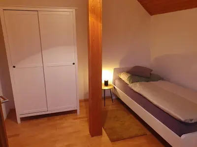 Ein Bett oder Betten in einem Zimmer der Unterkunft Fewo Eifelhöhe
