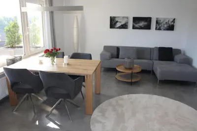 Ein Sitzbereich in der Unterkunft Moderne Ferienwohnung 