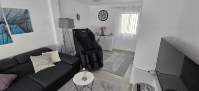 Ein Sitzbereich in der Unterkunft Ferienhaus Bergrath