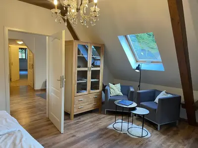 Ein Bett oder Betten in einem Zimmer der Unterkunft FEWO Königsberg Weingut C A Haussmann
