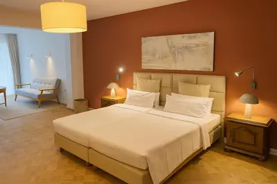 Ein Bett oder Betten in einem Zimmer der Unterkunft Hotel Alte Mühle