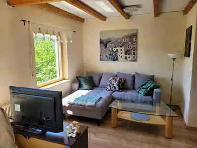 Ein Sitzbereich in der Unterkunft Ferienwohnung im Haus Waldblick