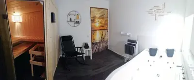 Ein Sitzbereich in der Unterkunft Ferienwohnung Christine mit Sauna und Whirlpool