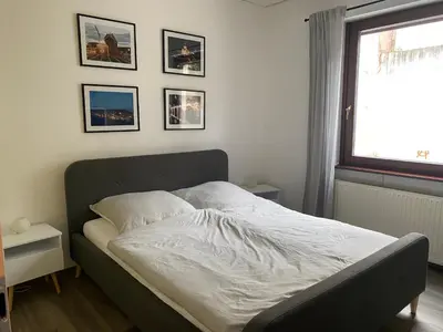 Ein Bett oder Betten in einem Zimmer der Unterkunft Ferienwohnung Bienengarten