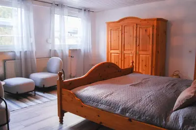Ein Bett oder Betten in einem Zimmer der Unterkunft Gästehaus an der Moseltherme