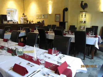 Ein Restaurant oder anderes Speiselokal in der Unterkunft Juffer Flair Restaurant Gästehaus