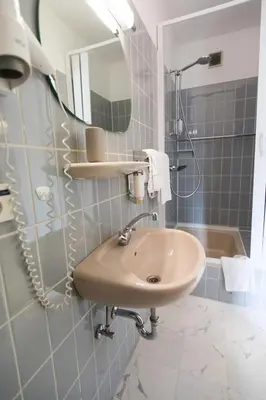 Ein Badezimmer in der Unterkunft RATSKELLER Hotel & Restaurant