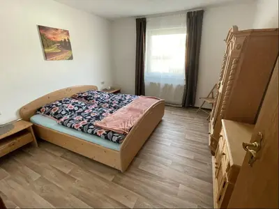 Ein Bett oder Betten in einem Zimmer der Unterkunft Relaxen am Ring Fewo 1